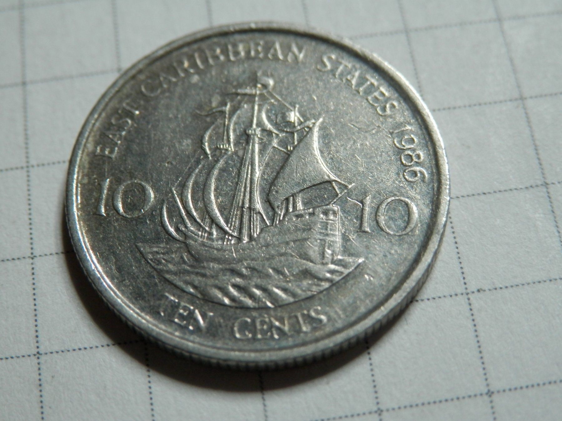 Tutti le monete: Ostkaribische Staaten 10 Cent, 1986 – Usato da Weiach venduto da weiach81 1