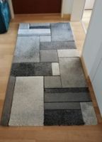 Teppich grau