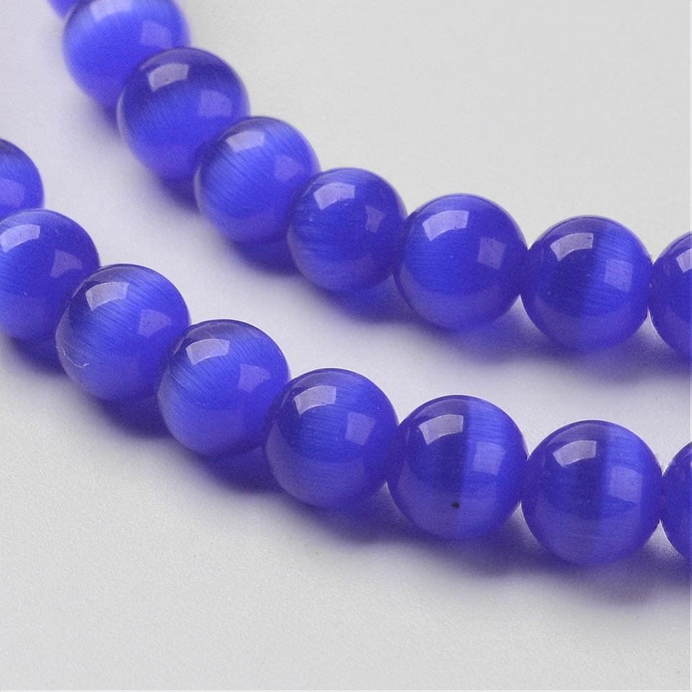 Perle (finte): 8 Cateye Glasperlen  dunkelblau   6mm – Nuovo (secondo la descrizione) da Alpnachstad venduto da perlengaby