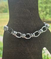 Bracciale in acciaio inossidabile con maglie ovali e nodi