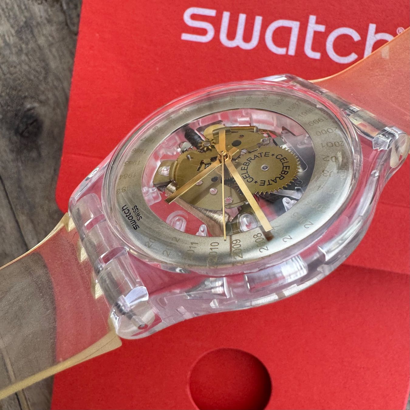 Swatch Montres: Swatch EST. 1983 SUOZ161 Skeleton Celebrate Transparent – D'occasion à Arzier-Le Muids par Avanna 3