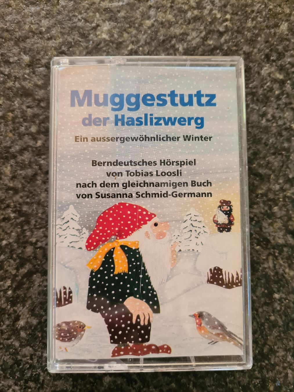 Musicassette: Muggestutz der Haslizwerg  - Ein aussergewöhnlicher Winter – Usato da frutigen venduto da Plethora14