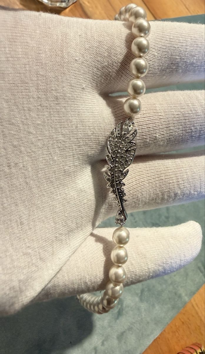 Swarovski Bracciali & Braccialetti: Swarovski Perlen/Feder Armband – Nuovo (secondo la descrizione) da Wildberg venduto da TradeMe 1