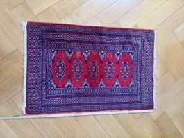 Kleiner roter Orientteppich 