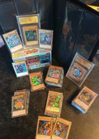 Lot 230 cartes Yu‑Gi‑Oh! SR/UR/Secret + 2 gradées + classeur