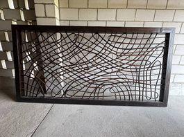 Wanddekor aus Rattan