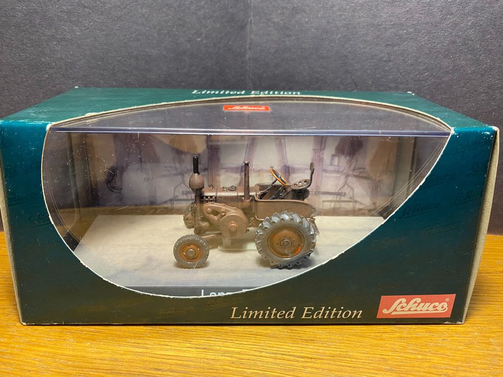 Schuco, Lanz-Eilbulldog mit 3-Achs-Anhänger - auctions & price archive