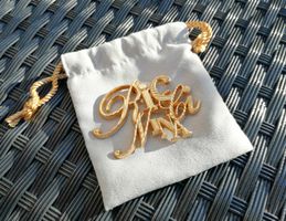 Brosche Original  Logo von Nina Ricci