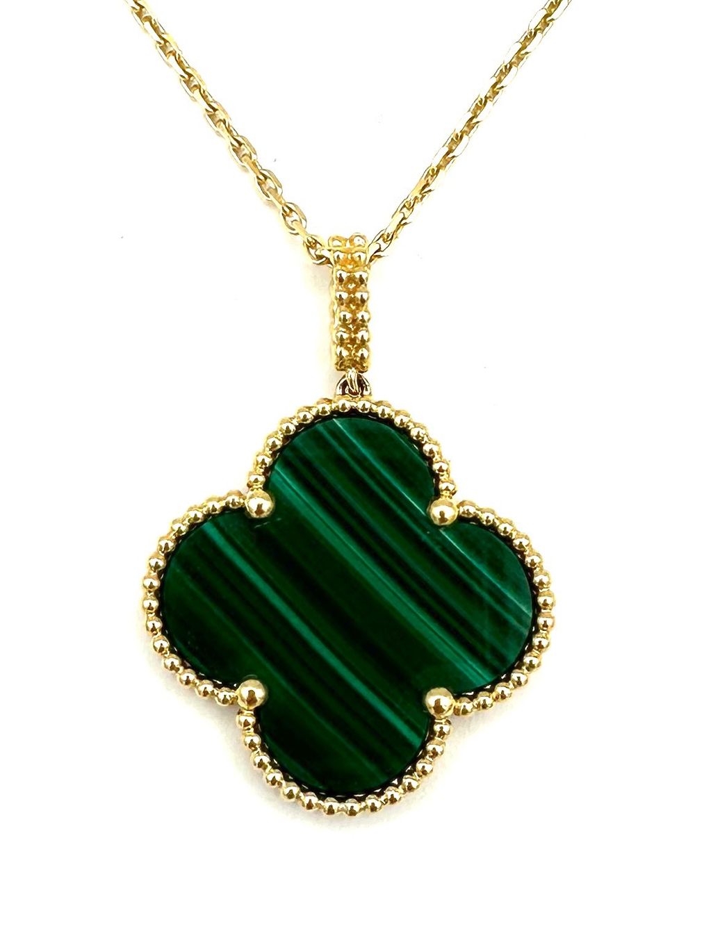 Van Cleef Catenine: VAN CLEEF & ARPELS. Sautoir "Magic Alhambra" or et malachite – Usato da Renens VD venduto da Diademe.sarl