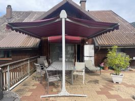 Store déroulant de 4 mètres pour terrasse