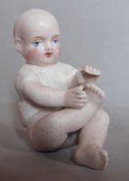 1900er Baby das mit seinem Fuß spielt / Bébé 1900