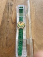 Montre Swatch automatique cadran vert bracelet cuir