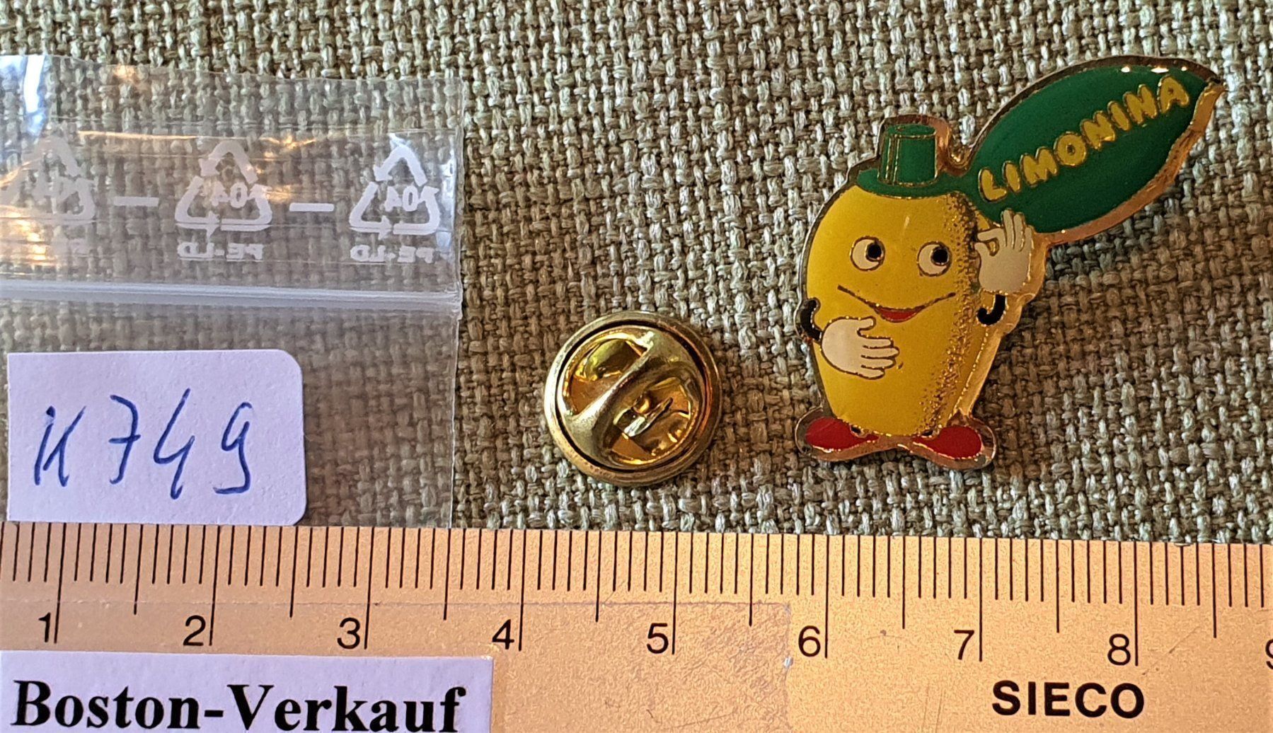 Placchette & Badge: K749 - Pin Zitrone Limonina Flasche – Usato da Reinach BL venduto da Boston-Verkauf 1