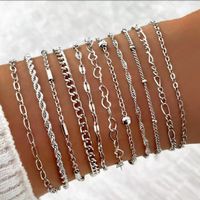 11 bracelets argentés, NEUFS