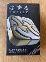 Casse-tête Huzzle Cast Square: Défiez votre esprit !