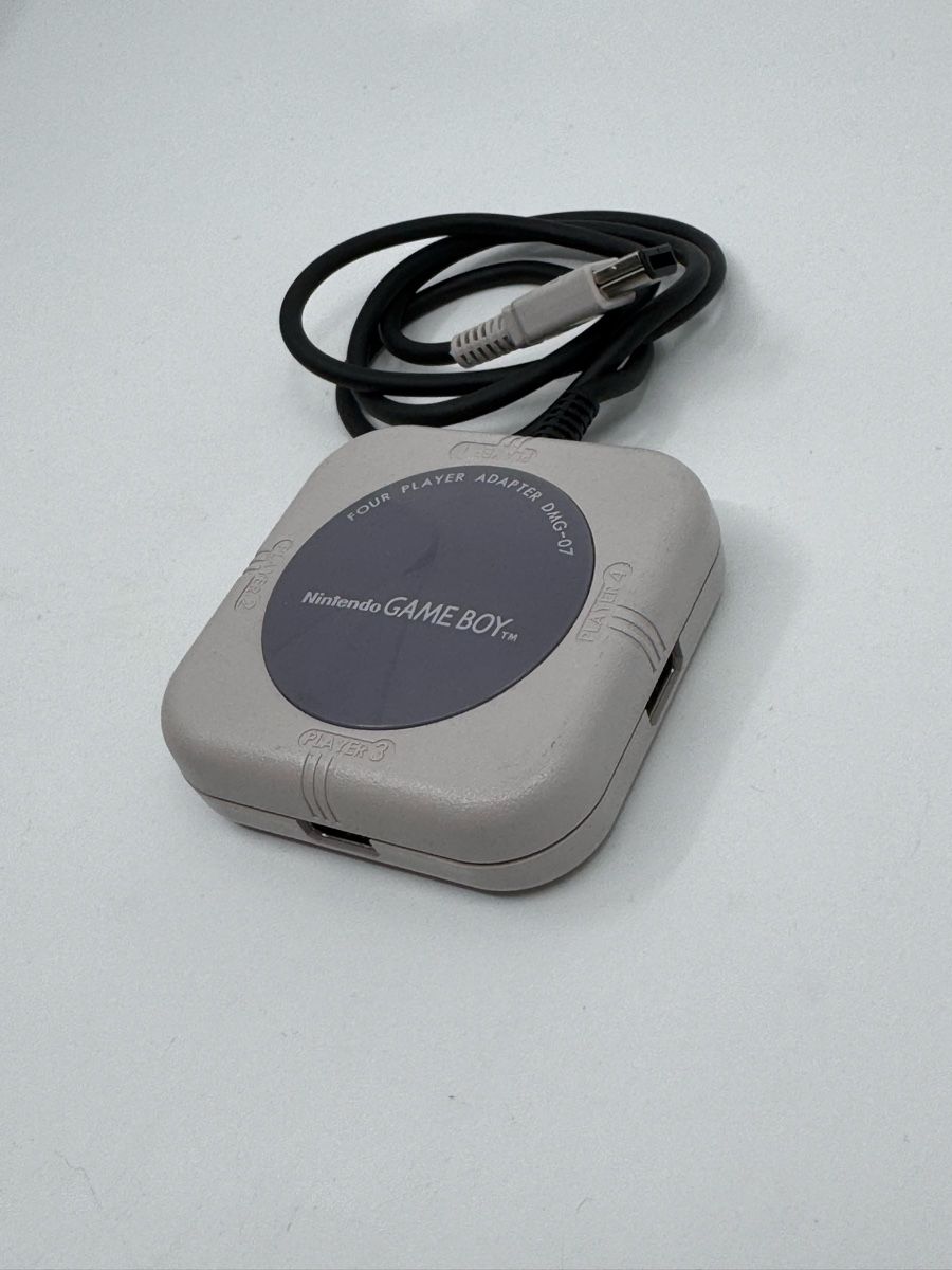 Nintendo Console: Original Nintendo Gameboy Four Player Adapter – Usato da Herisau venduto da Seyashop1 1
