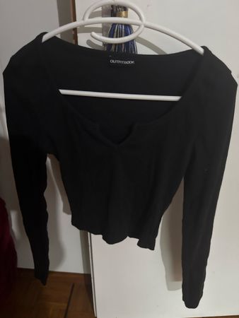 Top noir de Outfitbook en S. 