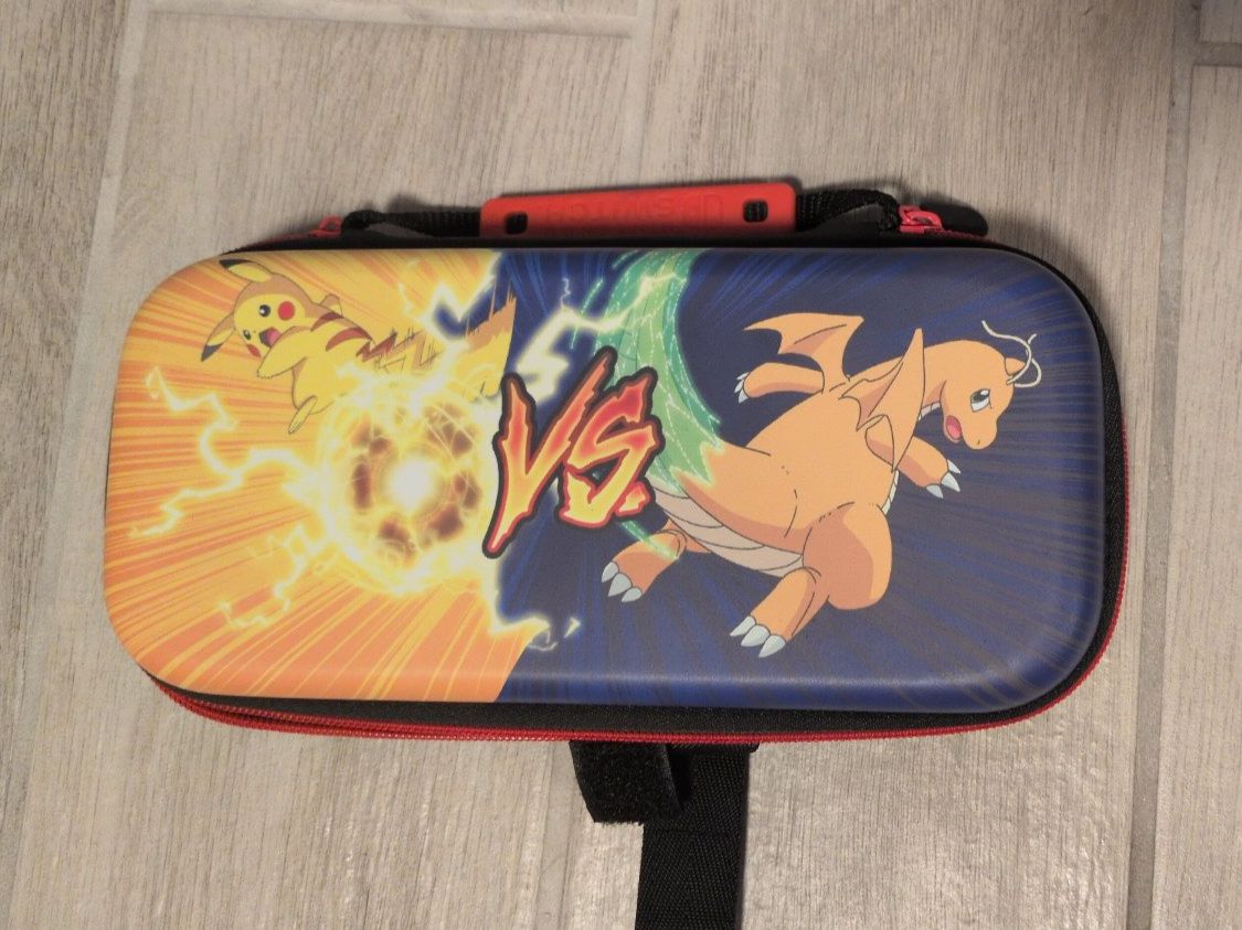 Nintendo Custodie protettive: Étui de transport Pokemon - Pikachu VS Dracofeu – Usato da Pully venduto da max_t56z
