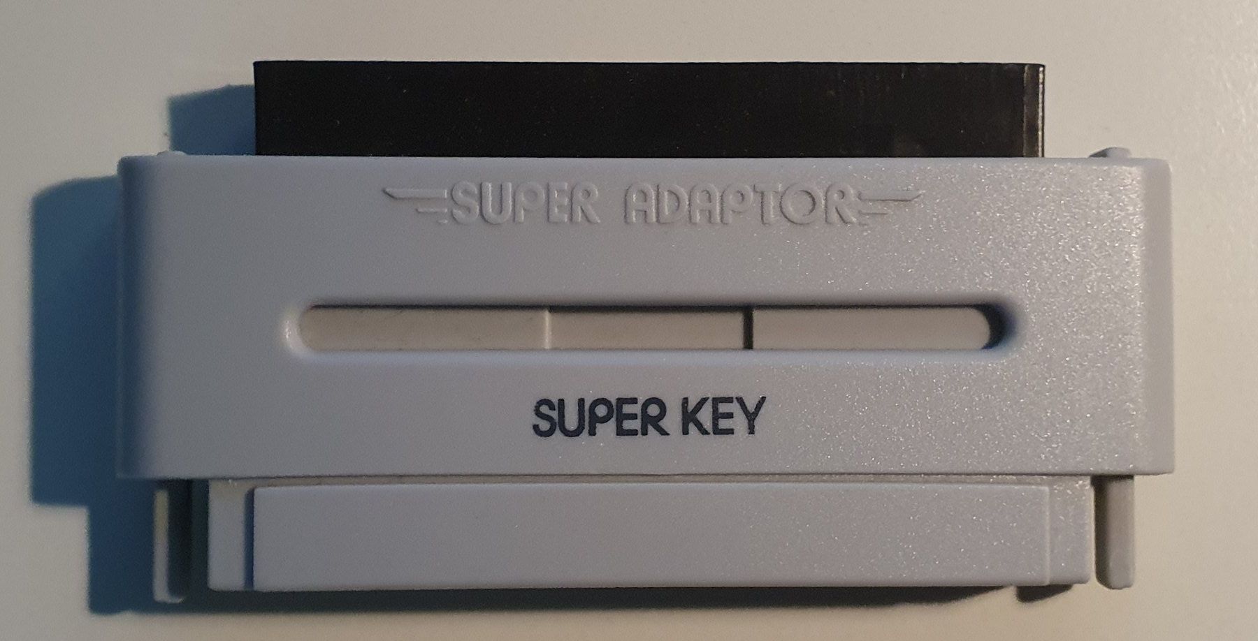 Giochi: Super Adaptor Super Key - (PAL SNES Import Adapter) – Usato da Freimettigen venduto da Expandch