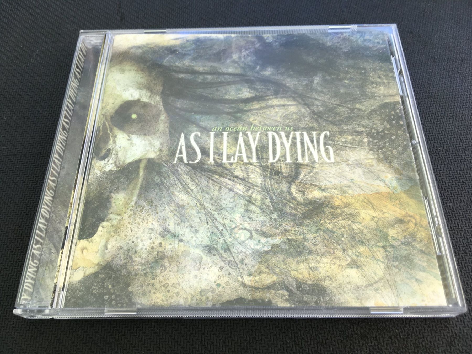 CD: As i lay Dying - An ocean between us -CD- – Usato da St.Gallen venduto da MedienJoe