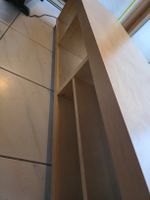 meuble TV en bois sur roulettes