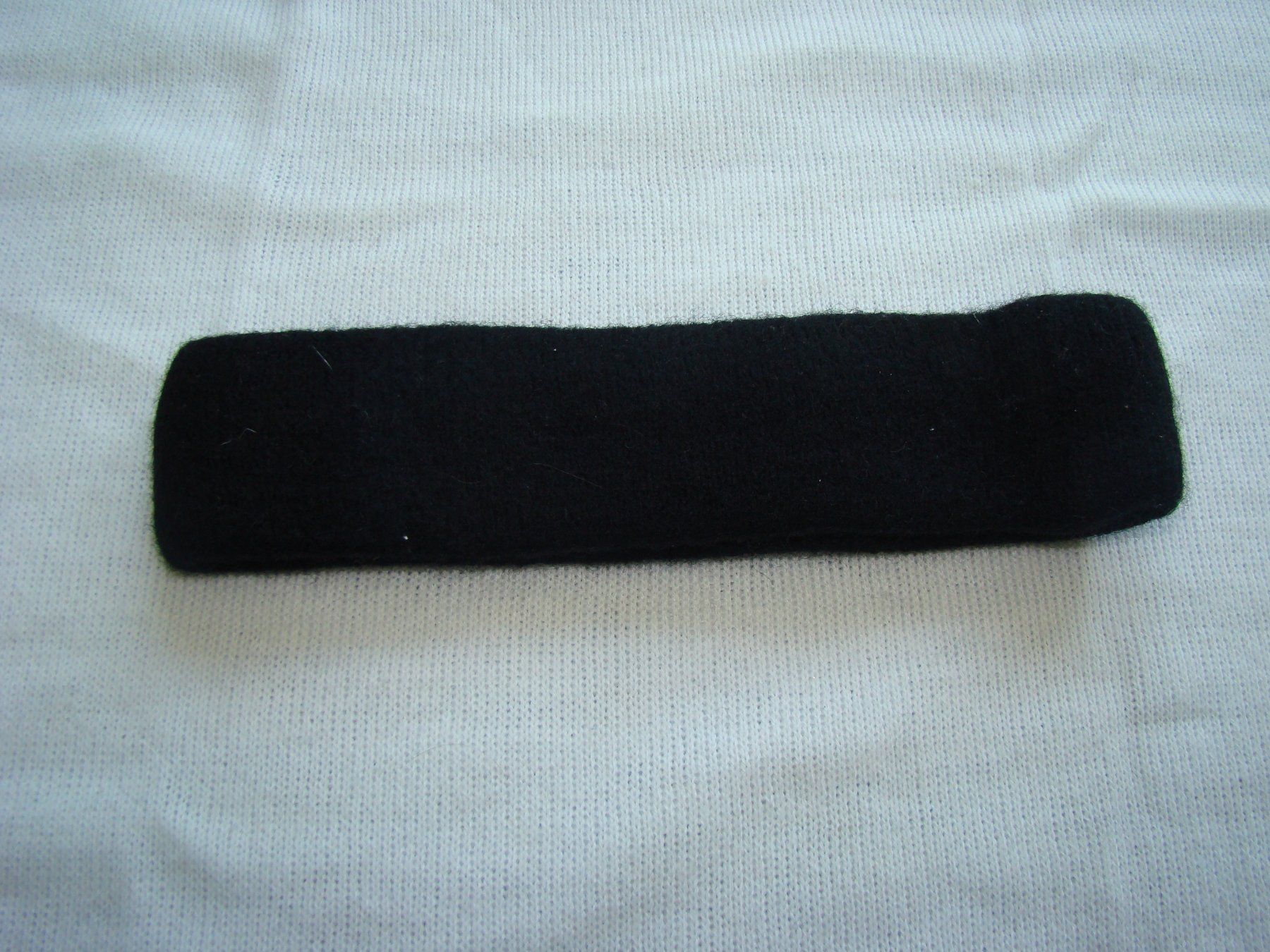 Copricapi, berretti & cappellini: Stirnband schwarz gestrickte Optik – Usato da Malters venduto da burzi
