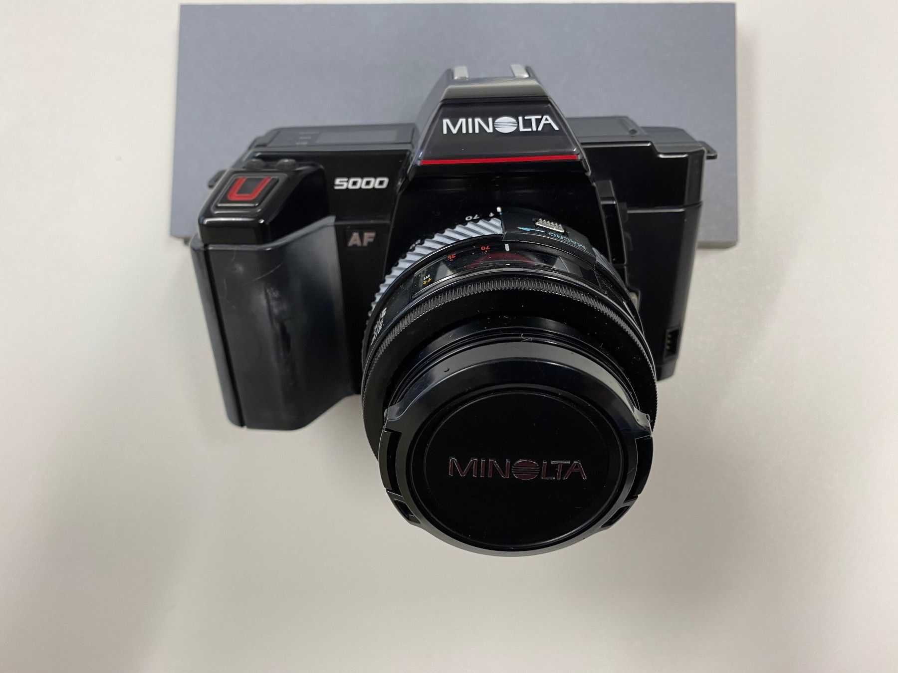 Minolta Fotocamera: Alte Minolta Kamera mit Blitzgerät – Difettoso da deitingen venduto da popcorn02 2