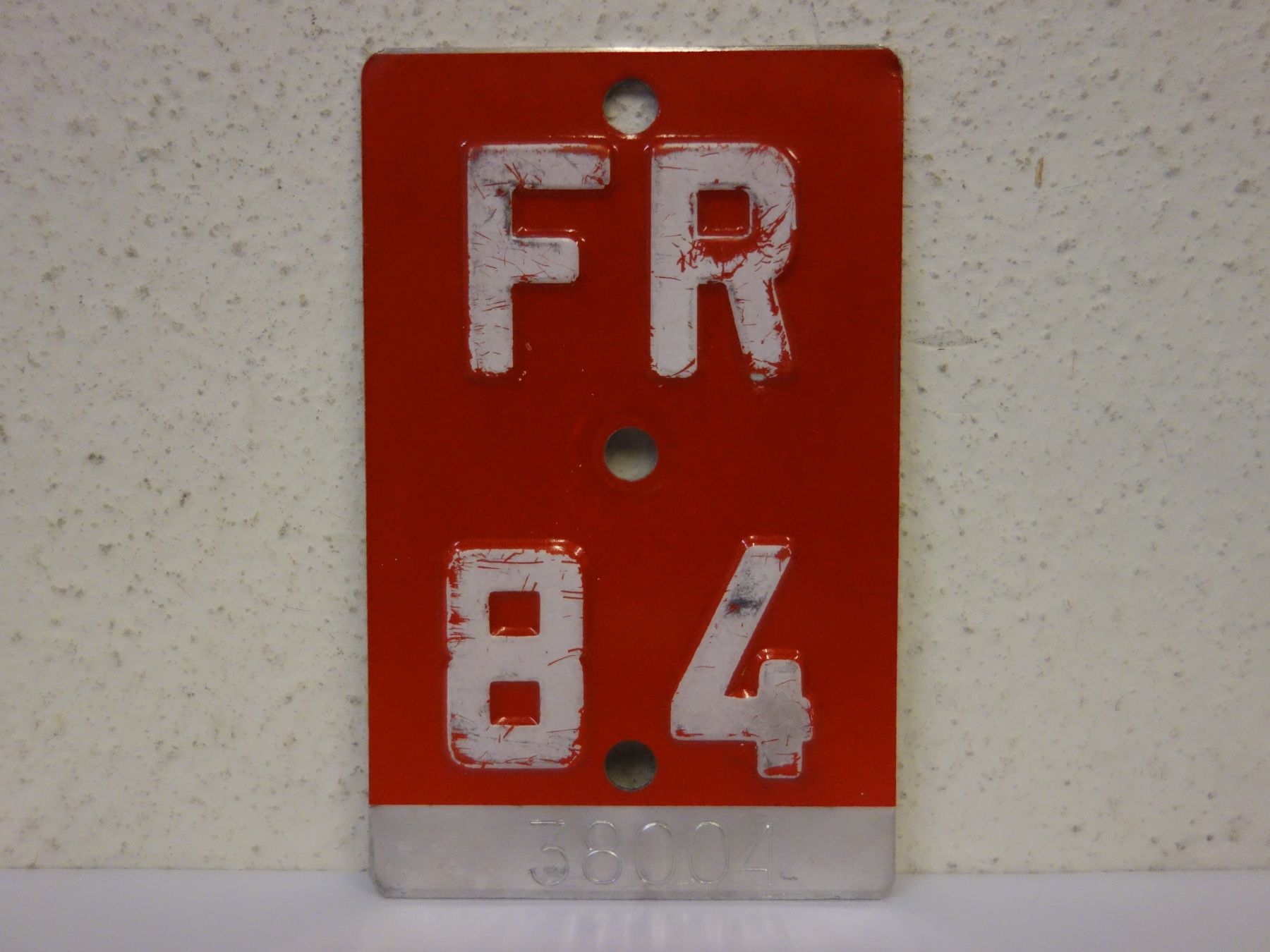 Insegne: FR 84 VELONUMMER - FAHRRADSCHILD – Usato da Kerzers venduto da zimmergruen