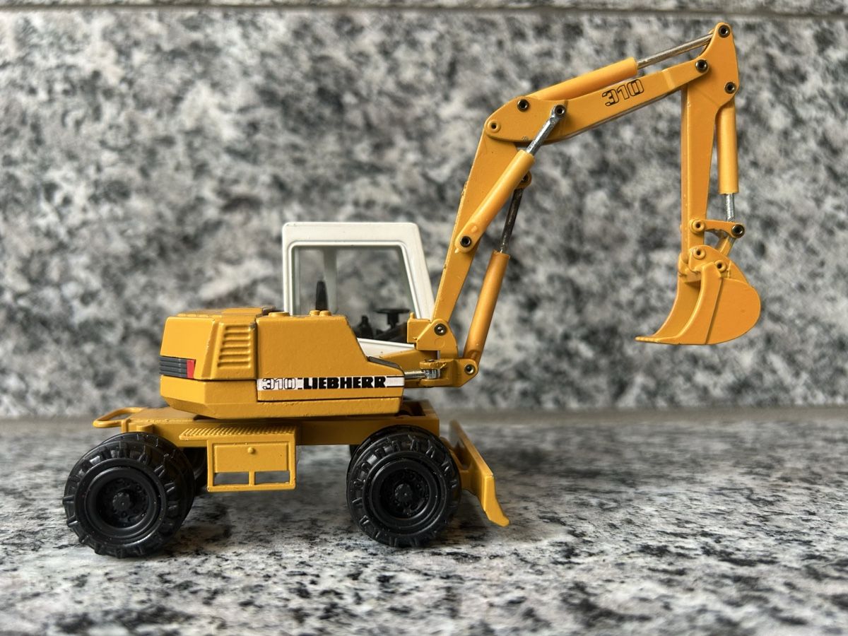 Liebherr Excavateurs: Liebherr 310 , 1:50 , Conrad – D'occasion à Horw par Tigercat635