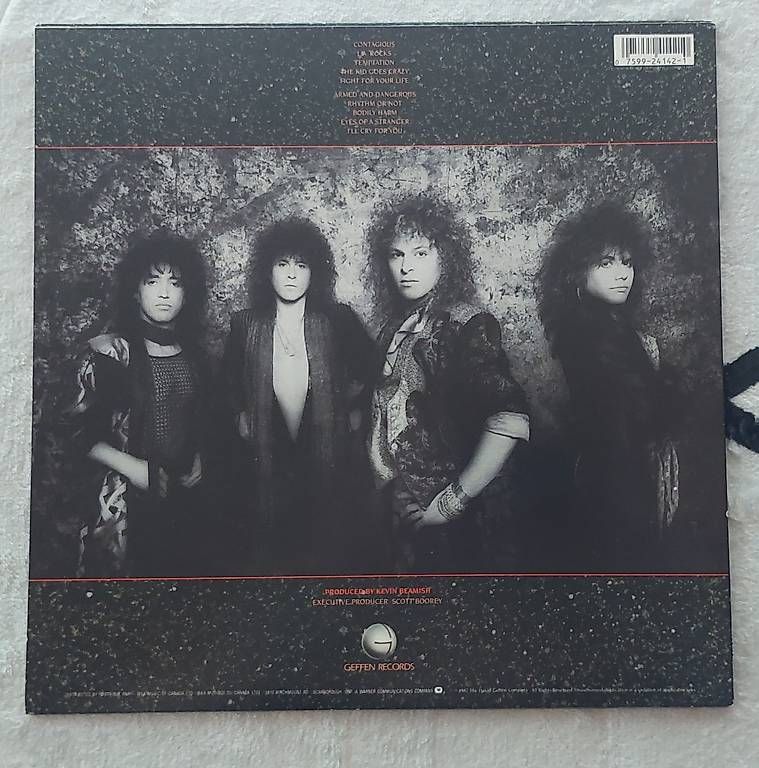 Dischi in vinile: Y&T : Contagious LP(1987) US-Hardrock – Usato da NENDELN venduto da Vinylandmote 3