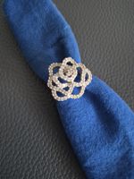 Swarovski Ring in Rosenform mit funkelnden Steinen.
