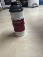 Milchportionierer