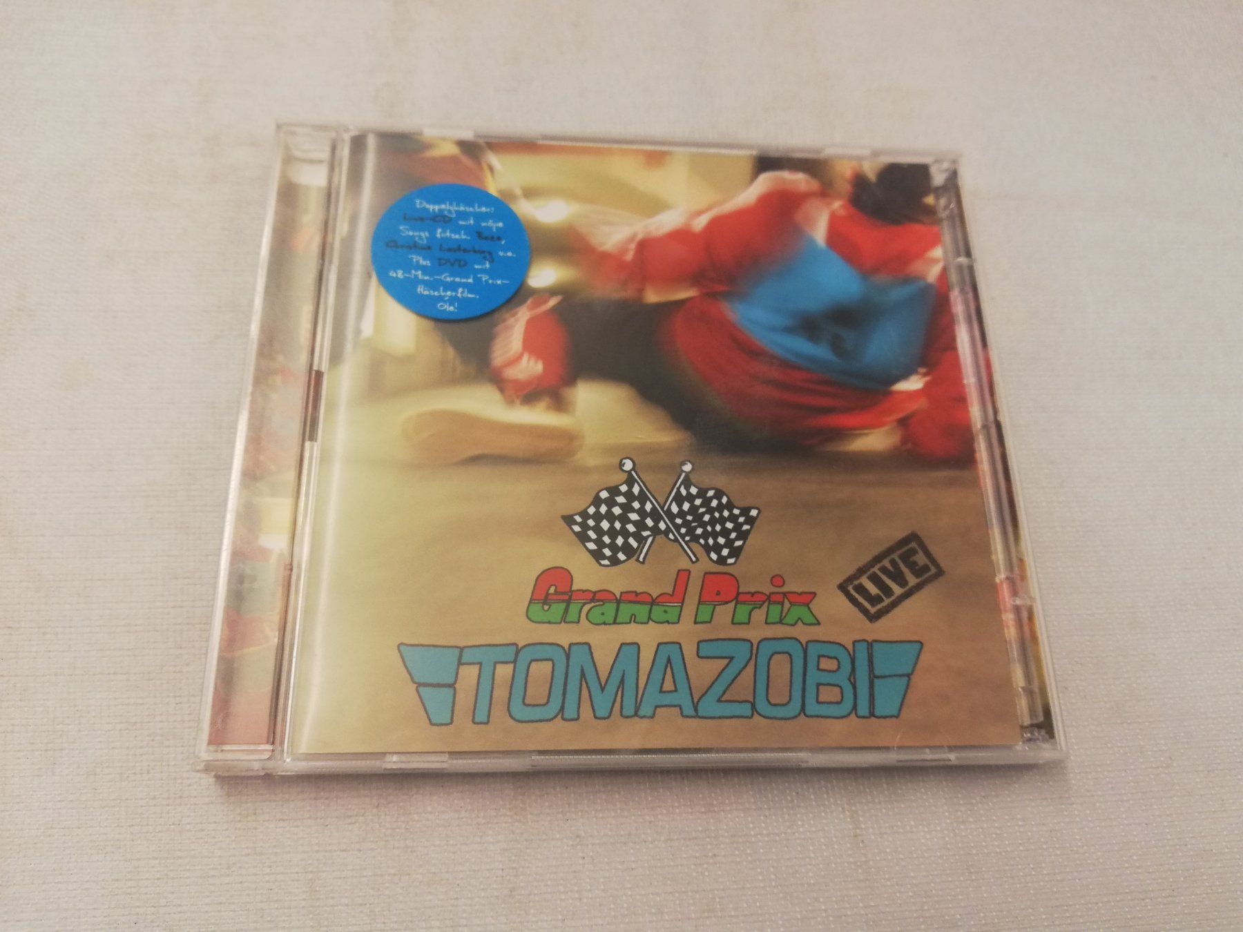 CD: TOMAZOBI - GRAND PRIX – Usato da Bern venduto da Vinylsound.ch