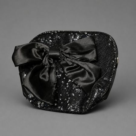 Pochette nera con paillettes e fiocco in raso