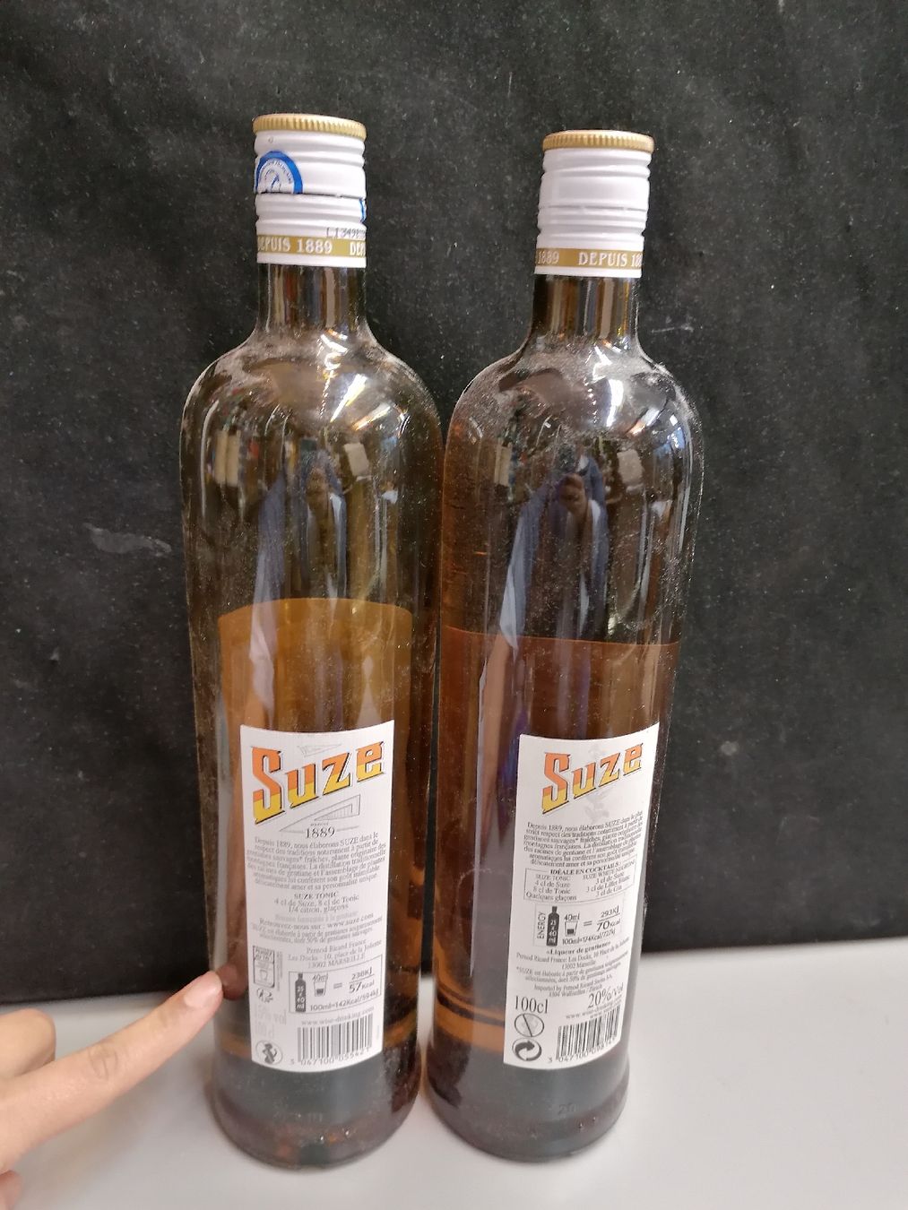 Spirituosen: 2 BOUTEILLES DE SUZE 1 ENTAMÉ 1 NEUF – Gebraucht aus Genève von Leboucheoreilles 2