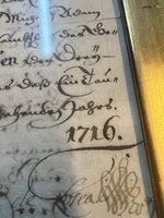 Alte Schriften von 1716 gerahmt