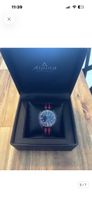 Montre Alpina GMT automatique boîtier noir bon état