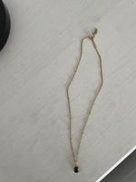 Collier fantaisie acier inoxydable avec pierre noire 
