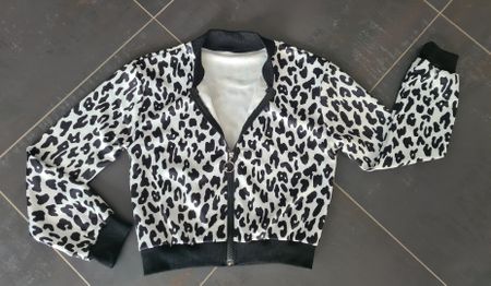 (NEUF)Blouson femme(36/38)Léopard satiné et doux Blanc/Noir