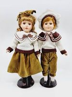 Couple de poupée en porcelaine - Charley & Pietro