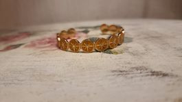 Bracelet jonc doré motif étoiles couleur ocre état neuf
