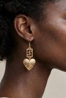 Orecchini pendenti color oro a forma di cuore