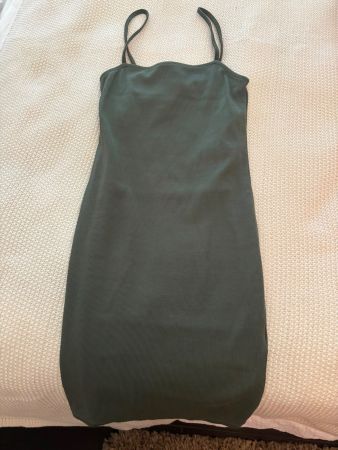 Grünes Sommerkleid. Woman.