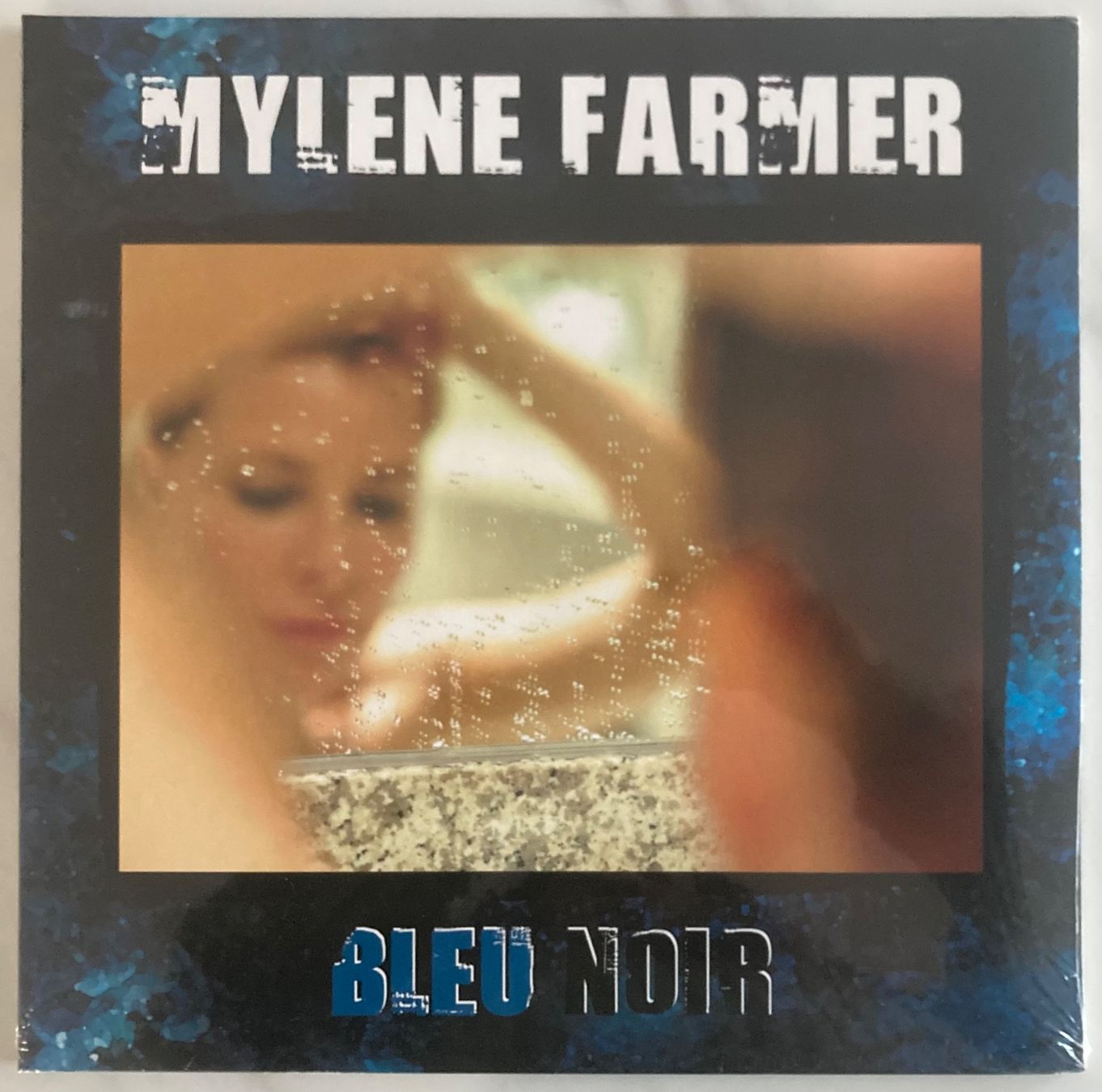Dischi in vinile: MYLÈNE FARMER - BLEU NOIR – Nuovo e nell'imballaggio originale da Poliez-Pittet venduto da Newtown-Records