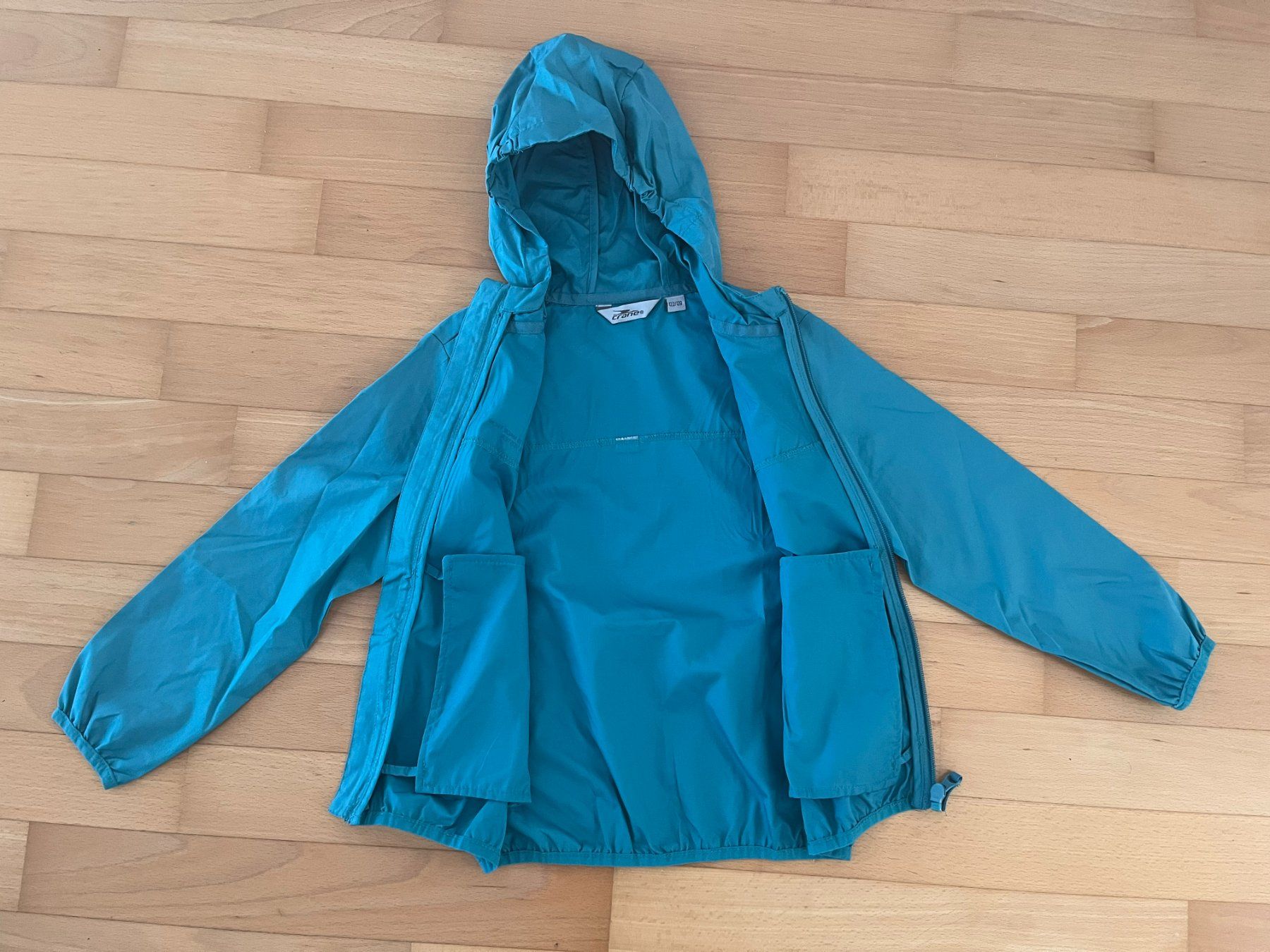 Giacche: Dünne Regenjacke türkis Gr. 122-128 – Usato da Muttenz venduto da Juvenile33 1