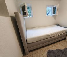 Neuwertiges Einzelbett inkl. Matratze & Topper