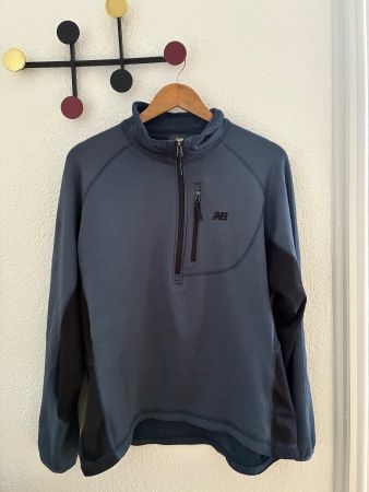 New Balance shell Gr. L