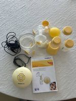 Medela tiralatte swing mani libere 10 pezzi inclusa shield