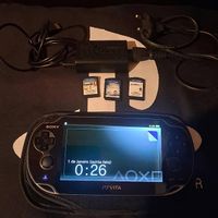 PS Vita quasi neuve + 3 jeux + housse + chargeur