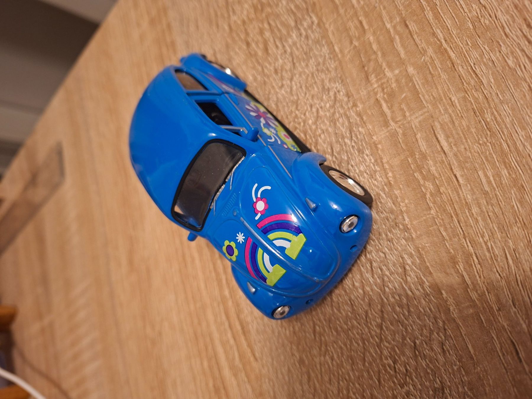 Volkswagen Modellini d'auto: VW Käfer Modellauto blau mit Blumenmuster – Usato da Ehrendingen venduto da CHMEX 5